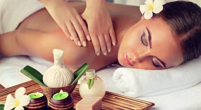 Body care. Spa body massage treatment. Woman having massage in the spa salon